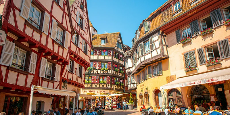 Half-timbered houses along a street in the Colmar old town