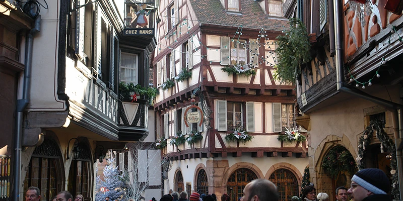 Carved oriel window on a historic Colmar building