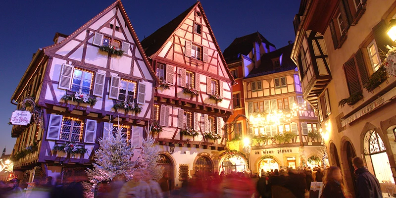 Half-timbered houses lit up for Christmas in Colmar