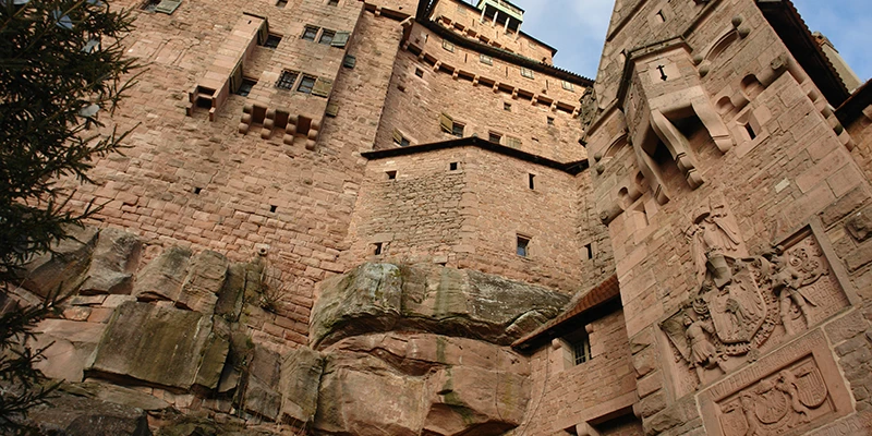 Red sandstone walls and windows of the upper castle at Haut-Koenigsbourg