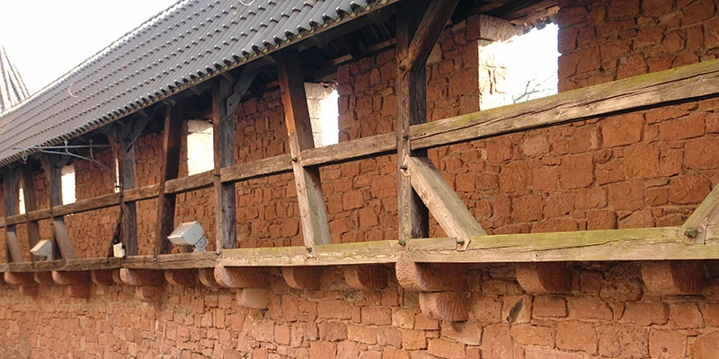 Reconstructed timber gallery running along the inner wall at Haut-Koenigsbourg