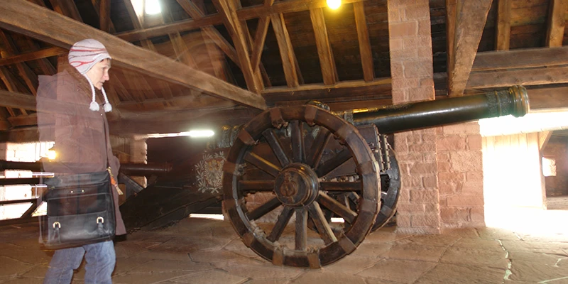 Cannon mounted under a timber roof at the great bastion of Haut-Koenigsbourg