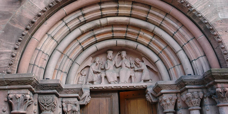 The carved Romanesque portal of the church of Sainte-Croix in Kaysersberg