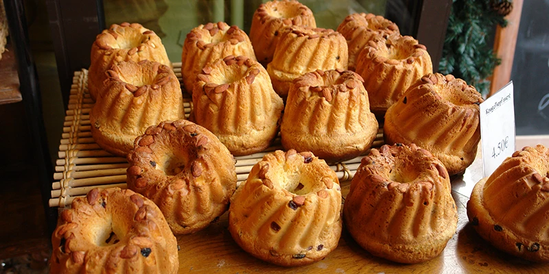 Tray of freshly baked kougelhopf cakes in a Ribeauvillé bakery