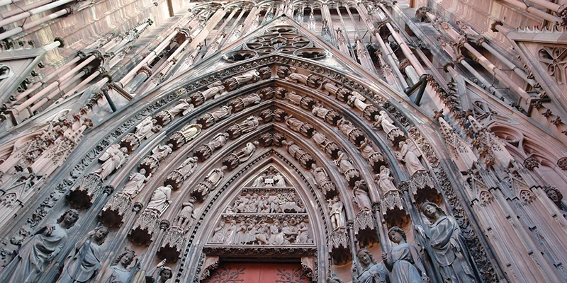 Densely carved stonework on the facade of Strasbourg Cathedral