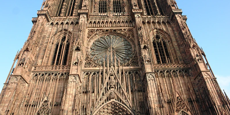 The west front of Strasbourg Cathedral with its single tower and rose window