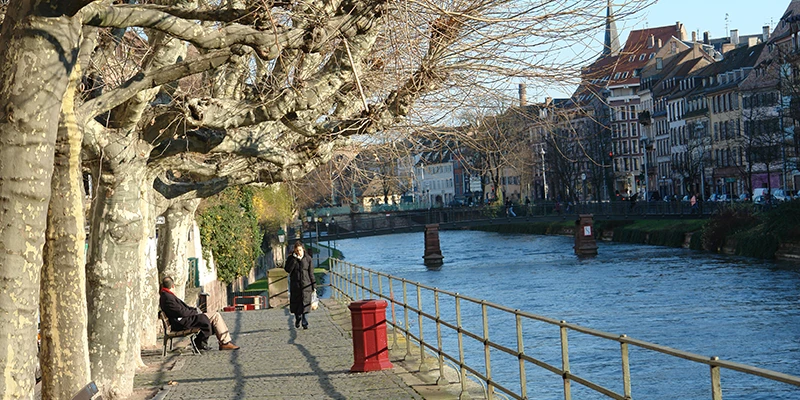 A riverside walking path along the quays in Strasbourg