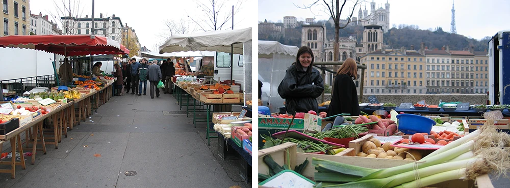 Covered market stalls in Lyon with produce laid out under awnings