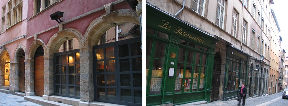 Arcaded shopfronts and a green painted storefront on a corner in Old Lyon