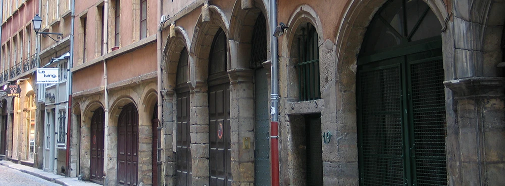 Old doorways and a green arched door in Old Lyon