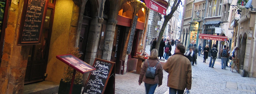 Restaurant chalkboard menus outside on a street in Old Lyon