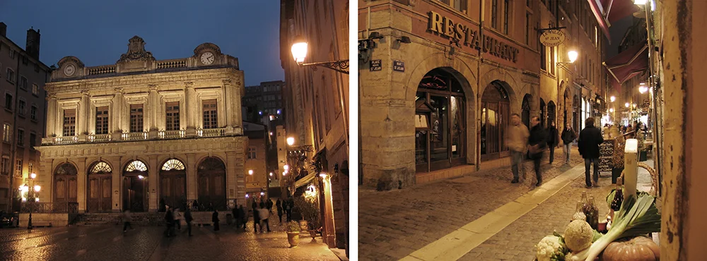 Building and a lit archway in Old Lyon at dusk