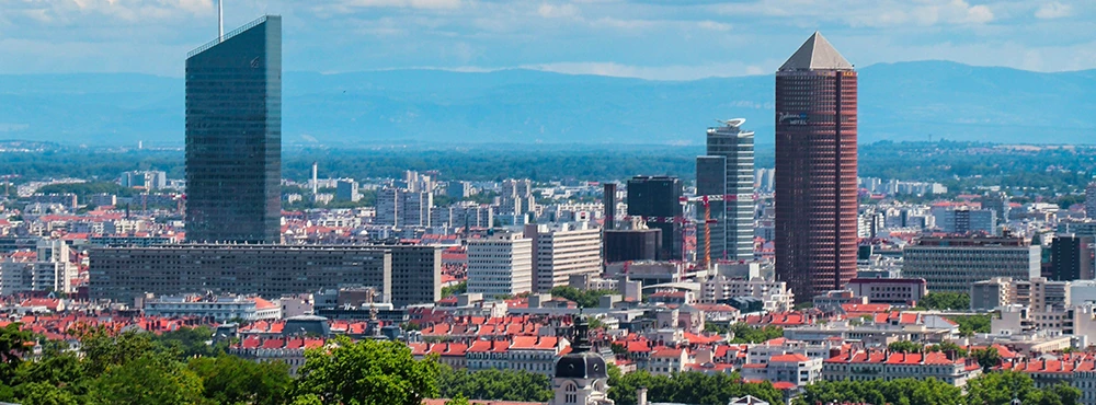 Panorama over the rooftops of Lyon with modern towers in the distance