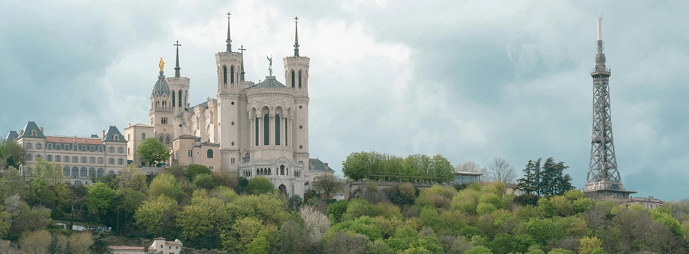 Fourviere basilica beside the metal tower on the hill above Lyon