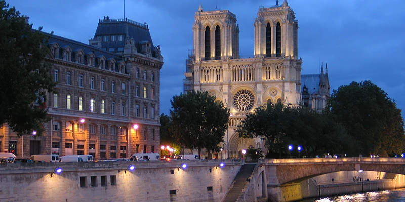 Notre-Dame and the Seine floodlit at night, Paris