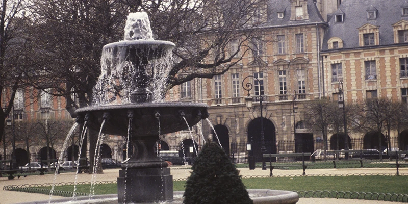 A fountain in the Place des Vosges, in the Marais, Paris