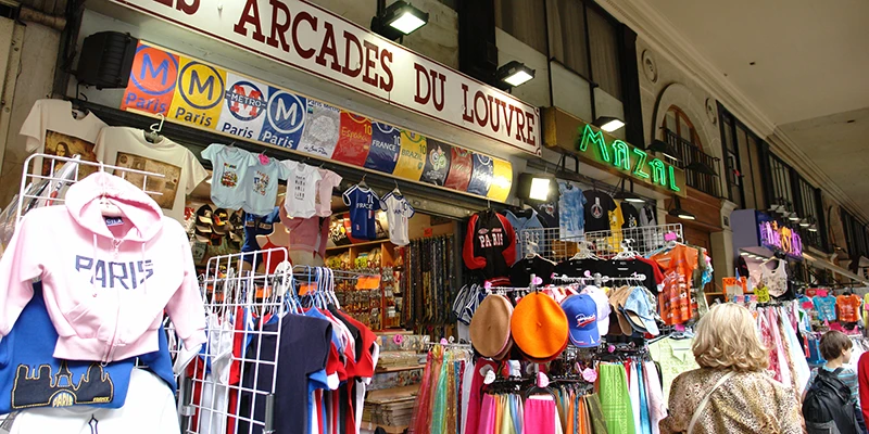 Shoppers under the arcades of the Rue de Rivoli, Paris
