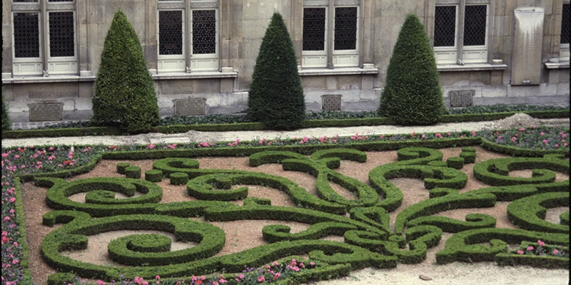 The garden courtyard of the Hôtel de Sully in the Marais, Paris