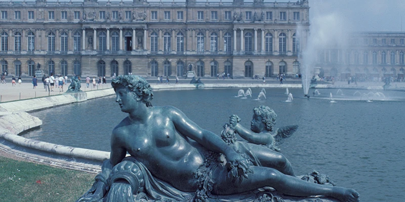 A fountain playing in the gardens at Versailles