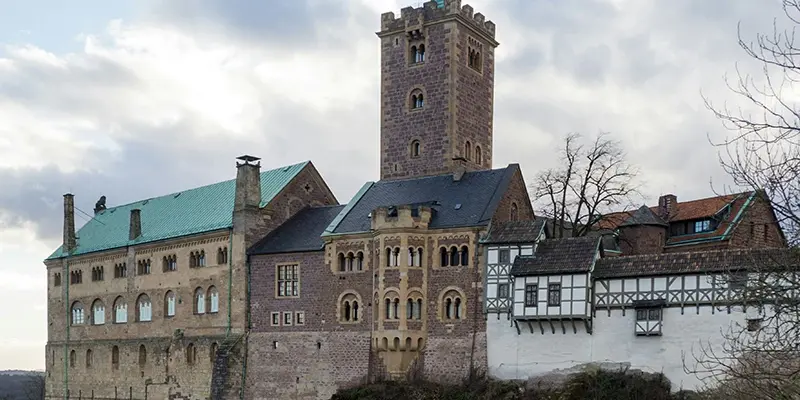 Wartburg Castle on its wooded hilltop above Eisenach
