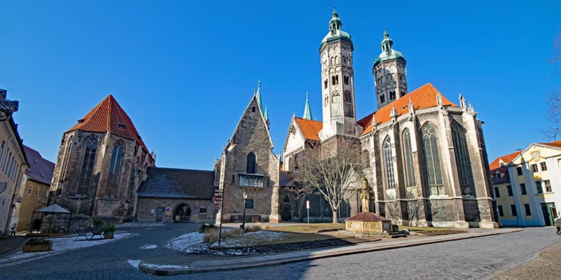 Naumburg Cathedral seen from its forecourt under a clear winter sky