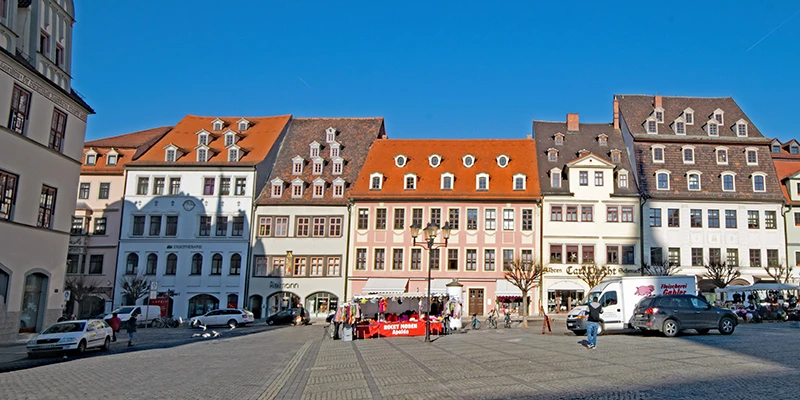 A row of gabled houses and market stalls on the Naumburg market square