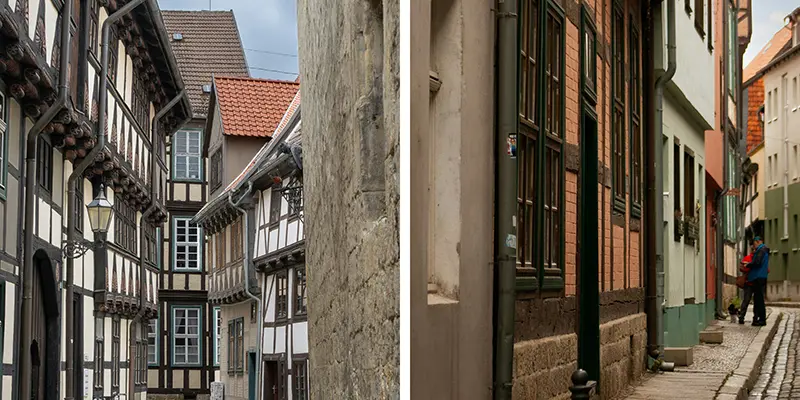 Tall narrow pedestrian lane with closely packed timber-framed houses