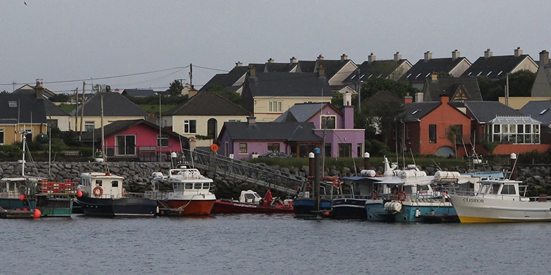 Closing view of Dingle town and harbor