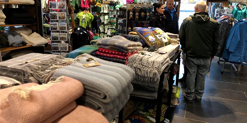 Aran sweaters and woolen goods on display in a Dingle shop
