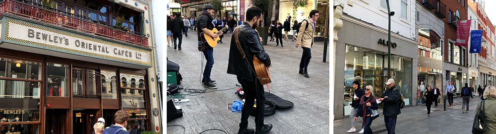 Grafton Street pedestrian promenade crowded with shoppers and buskers