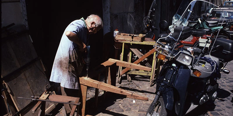 Alley with furniture restorer