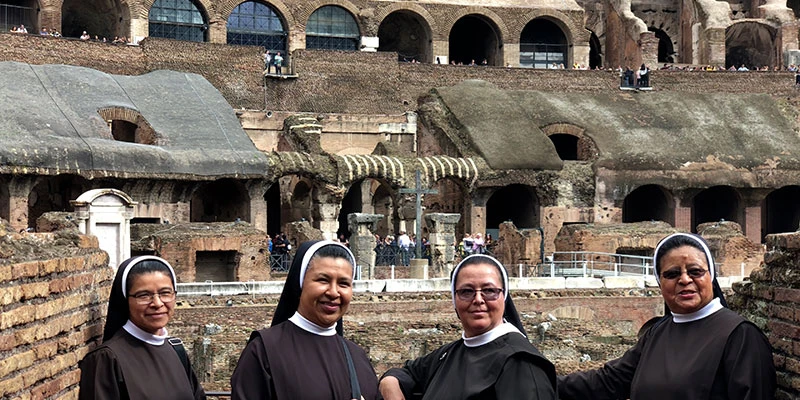 Colosseum with nuns