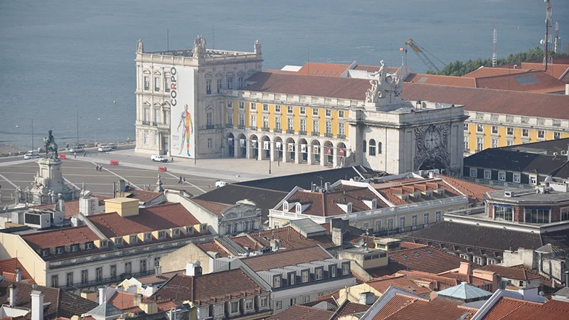 Praca do Comercio and the Lisbon waterfront seen from above with the bridge beyond