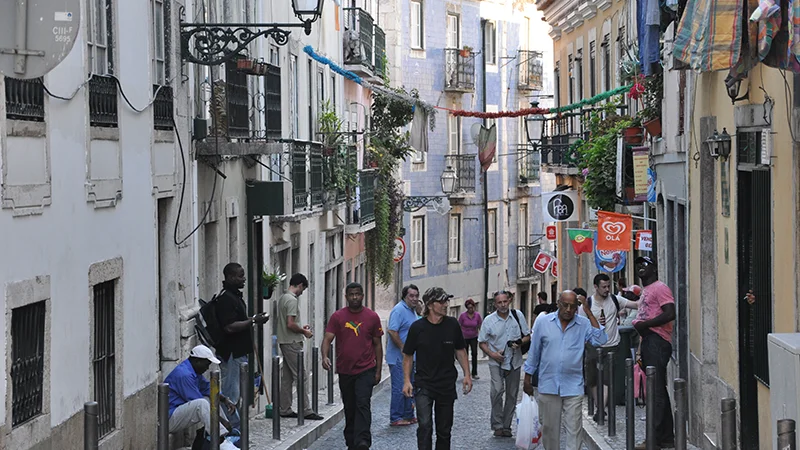 Busy street of pedestrians in the Bairro Alto district of Lisbon