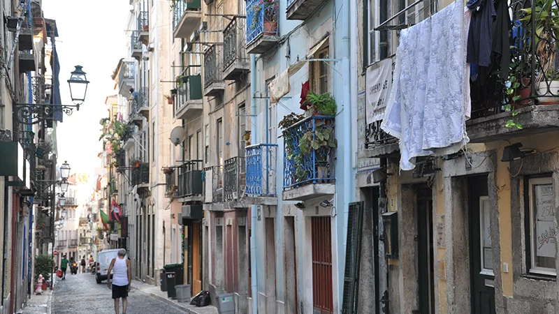 Laundry strung across a narrow street in Bairro Alto Lisbon