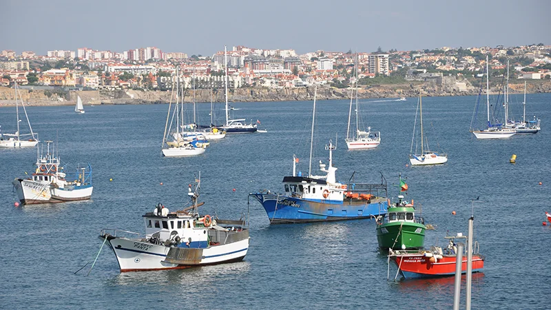 Harbor at Cascais with fishing boats moored
