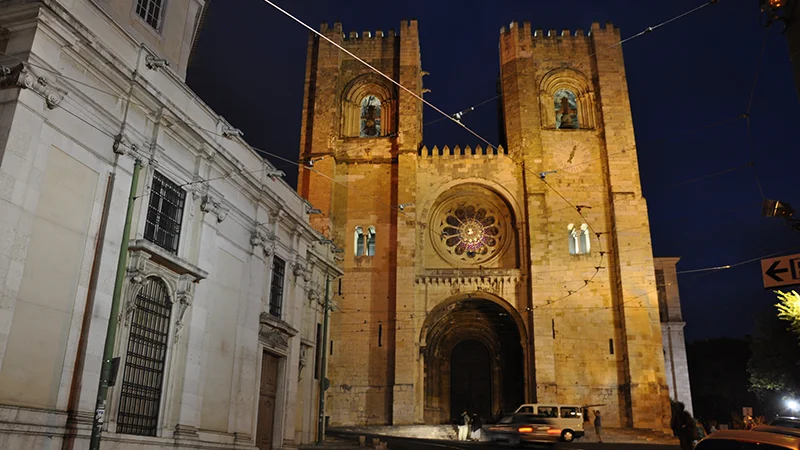 Lisbon Cathedral facade illuminated at night