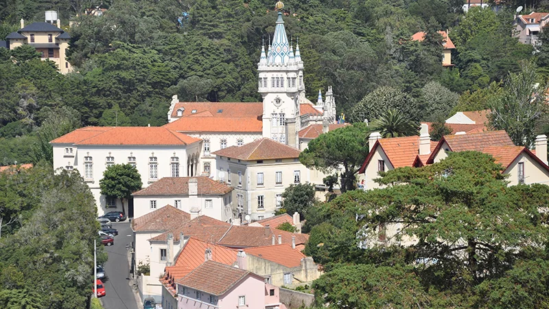 View over Sintra town with the tower of the National Palace among the trees