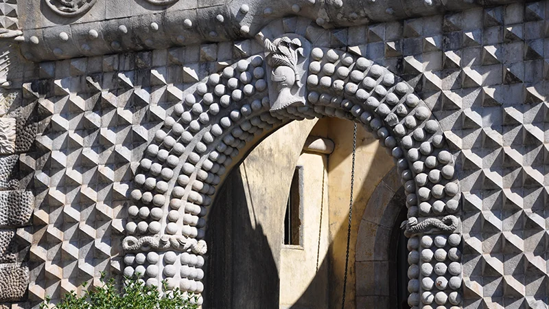 Elaborate studded stone archway at Pena Palace Sintra