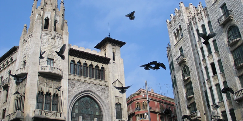 Elegant Modernista building facade in Barcelona's Eixample district showcasing Art Nouveau architectural details