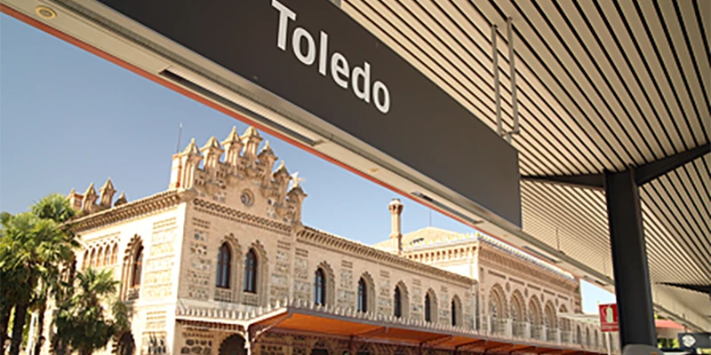 Toledo Railway Station, a striking Mudéjar-style building at the foot of the old town