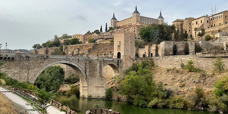 Panoramic view of Toledo's historic skyline rising above the Tagus River gorge