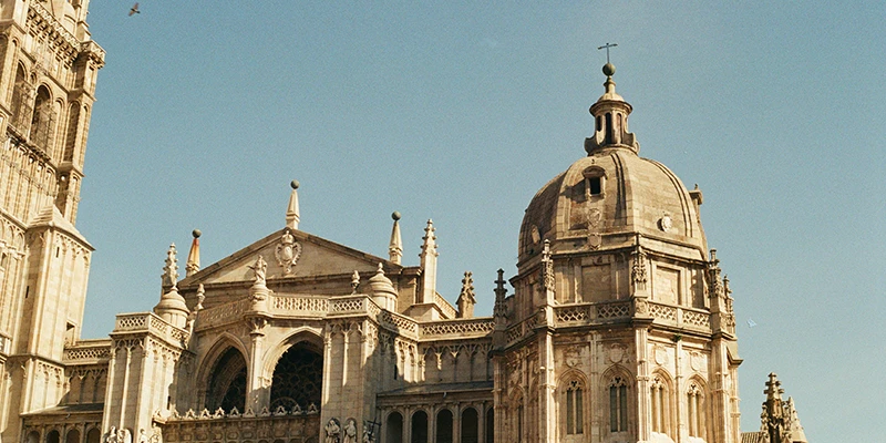 Toledo Cathedral exterior with Gothic towers and elaborate facade