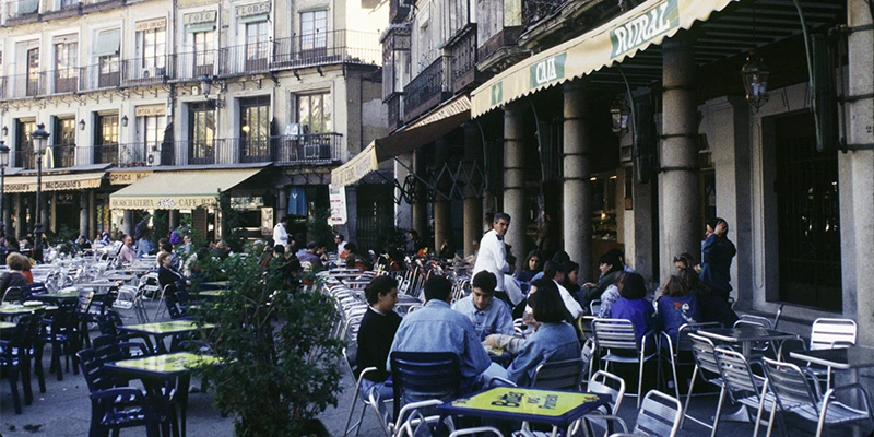 Calle Comercio, the main pedestrian shopping street connecting Zocodover to the cathedral