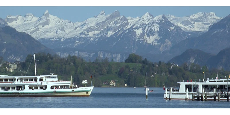 Lake Lucerne with boats and mountains