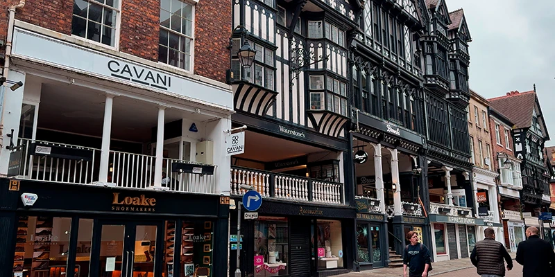 Shoppers on the covered upper walkway of the Rows in Chester