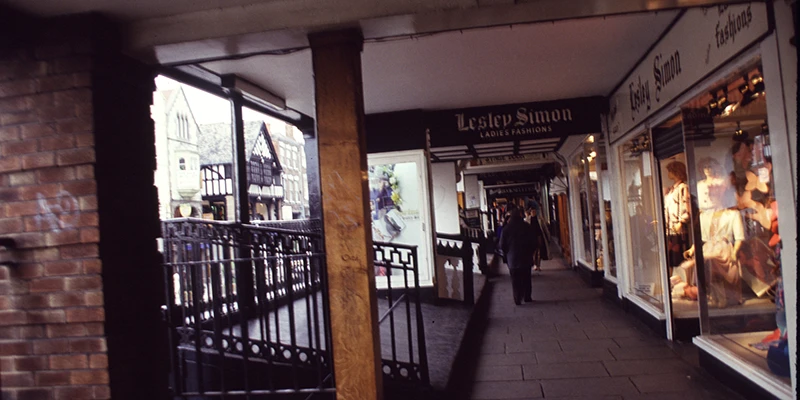 A dark brick-vaulted passage along the Rows in Chester