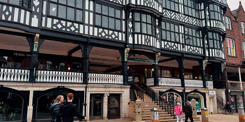 Stone steps leading down from the upper Rows walkway in Chester