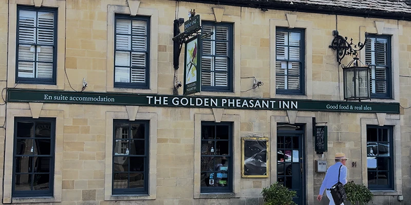 The Golden Pheasant Inn pub facade with traditional signage