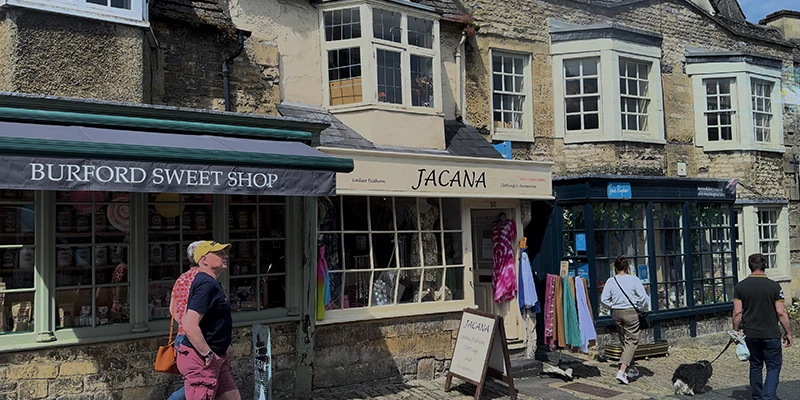 Burford Sweet Shop and Jacana boutique with colorful storefront displays